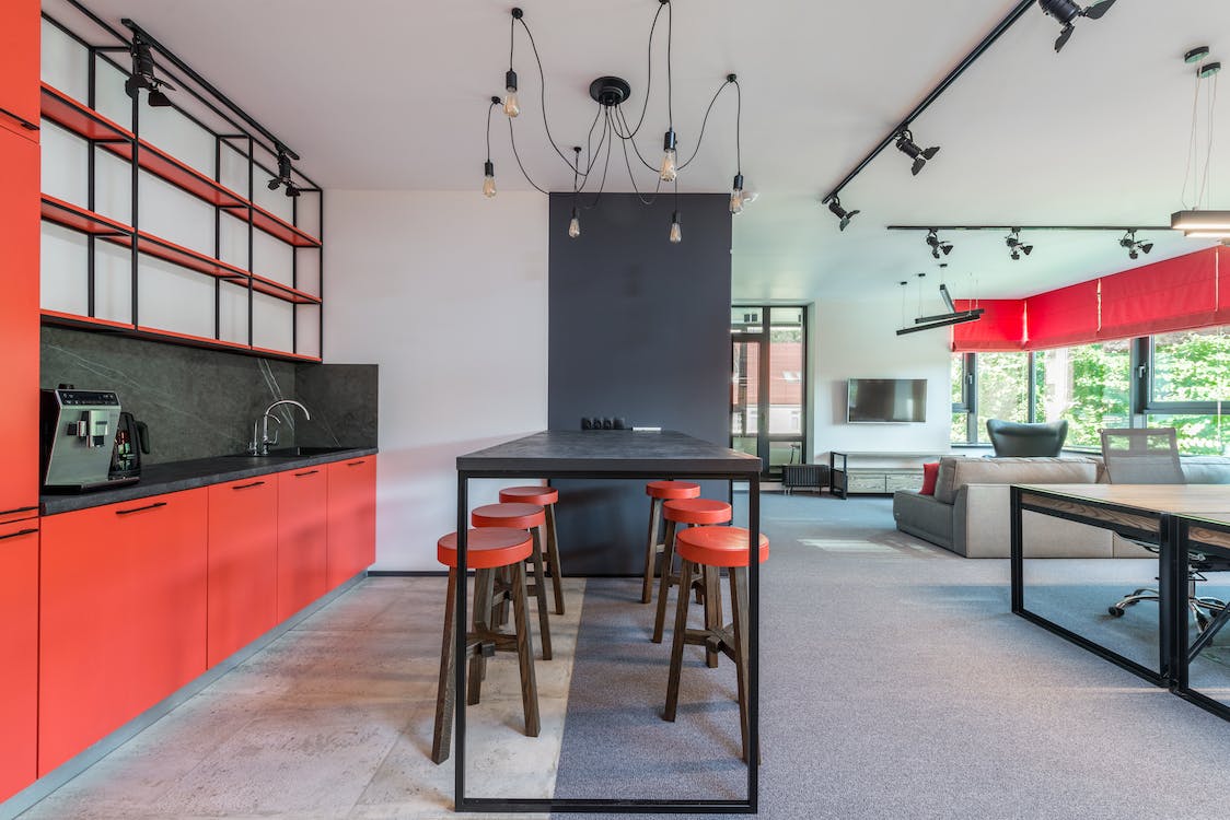 A modern, red and white kitchen