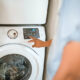 Man using a washing machine